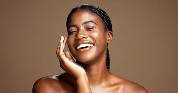 skincare-smile-black-woman-studio-600nw-2652487623